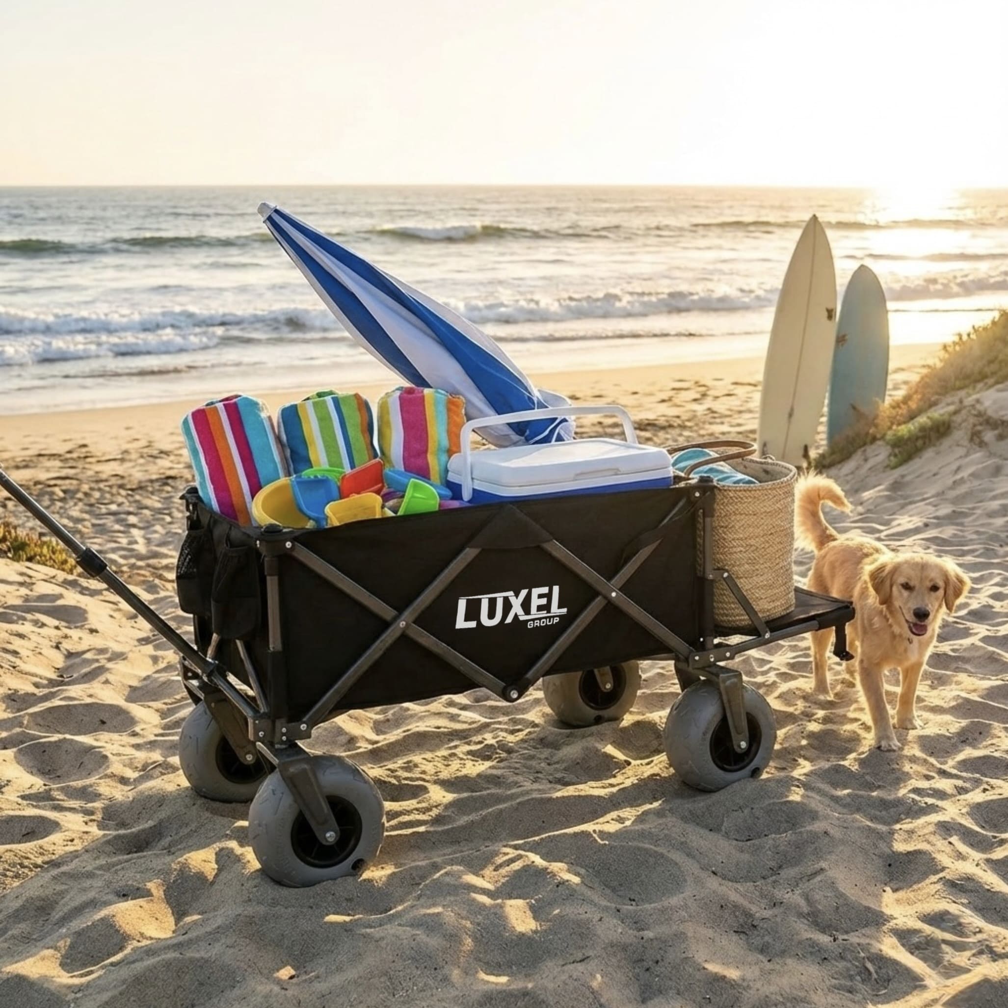 Luxel beach wagon with beach gear on a sandy beach with a dog.