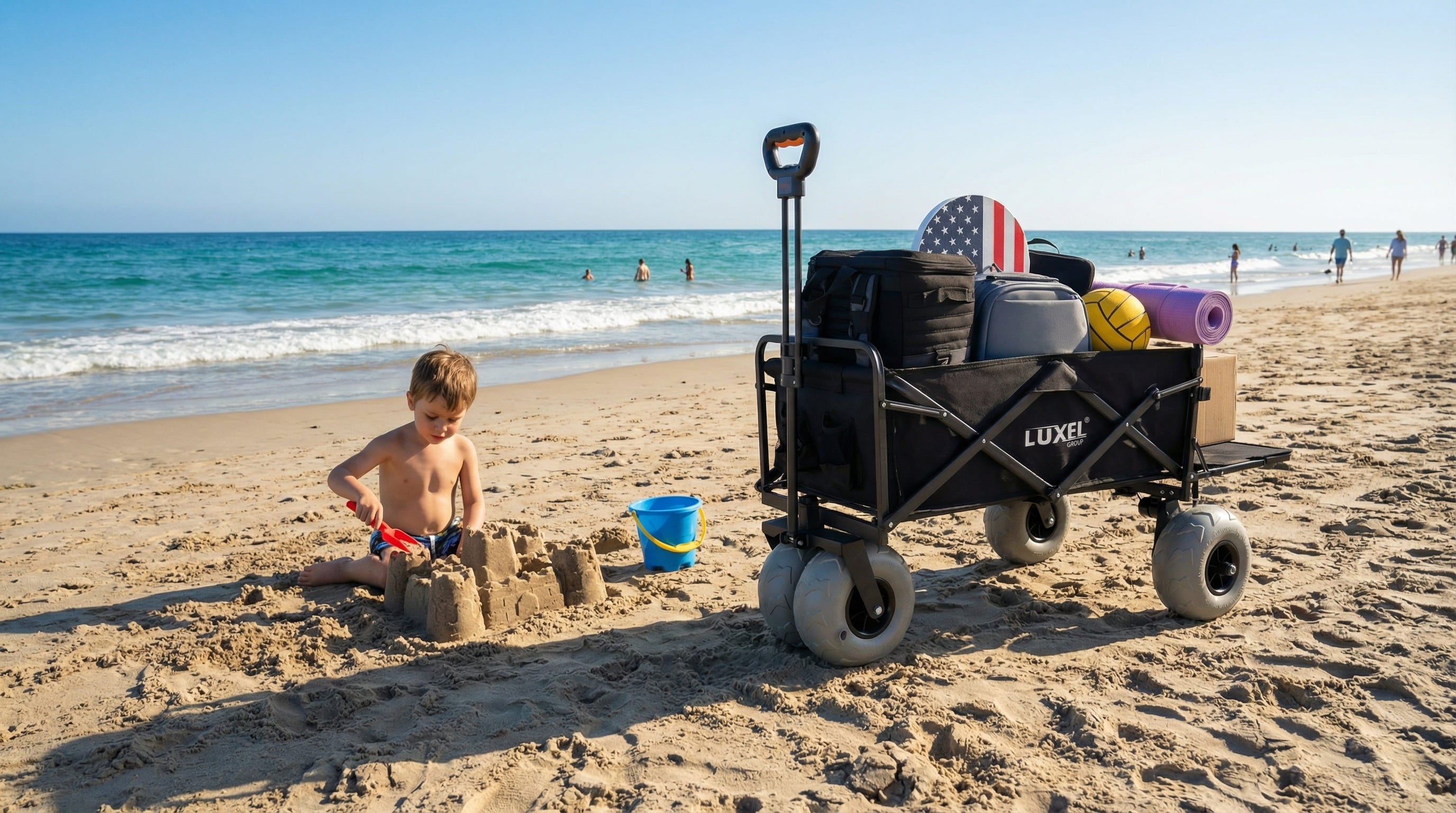 Child building a sandcastle on a beach with a Luxel beach cart in the background.