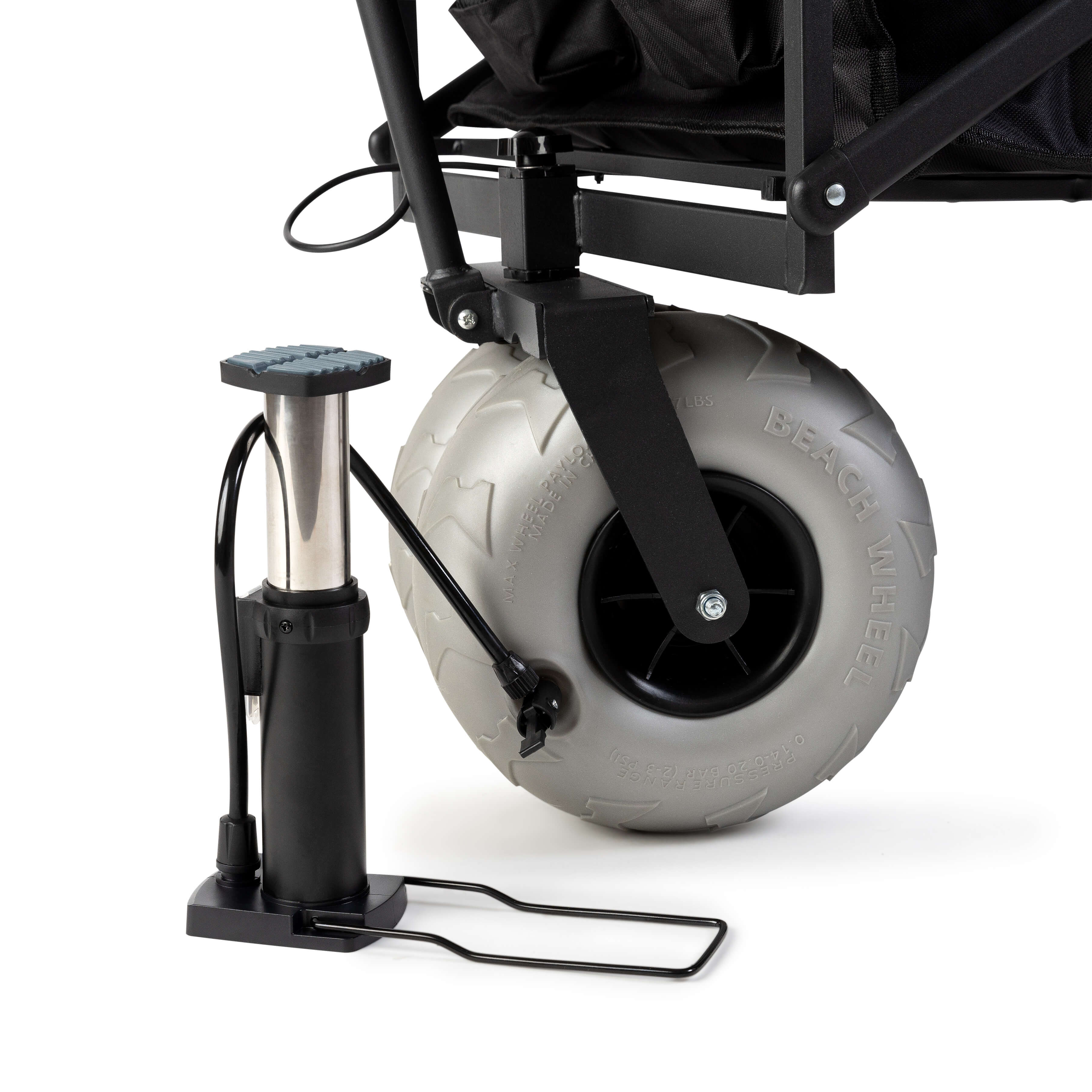 Large gray inflatable beach wheels on Luxel Group wagon with included foot pump for easy inflation.