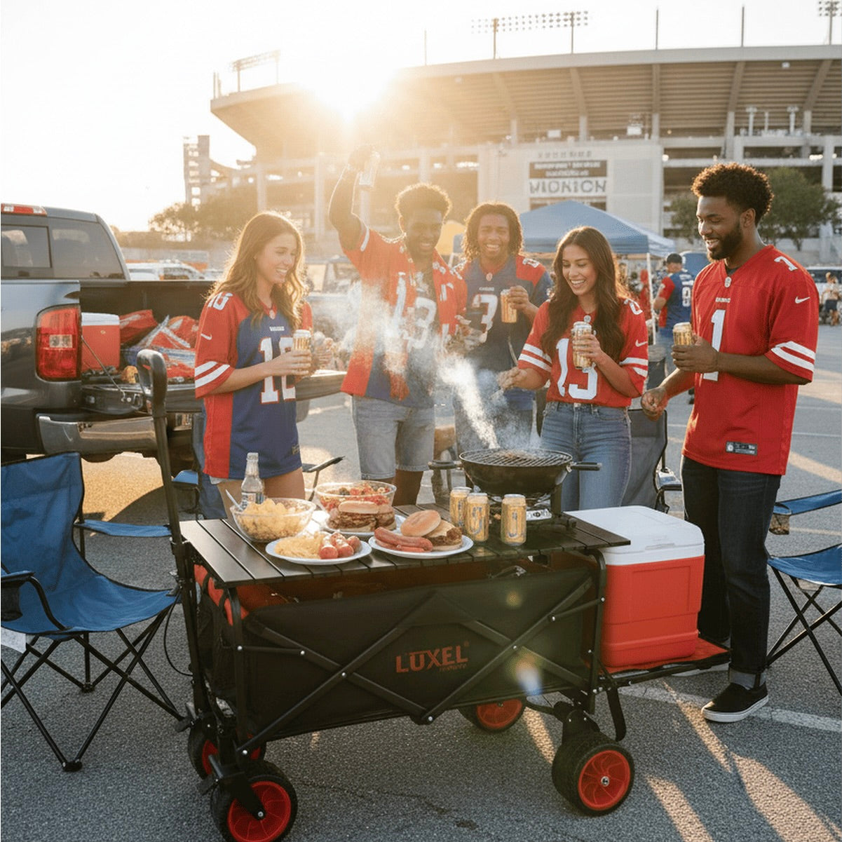 Group of people in sports jerseys around a grill and cooler at a stadium tailgate.