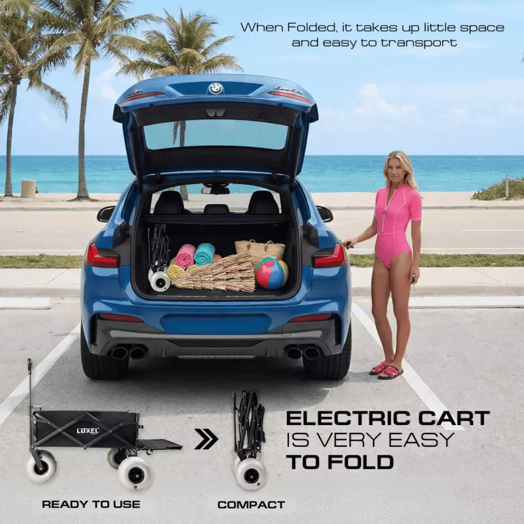 Blue car with open trunk and electric cart, woman in pink swimsuit by ocean.