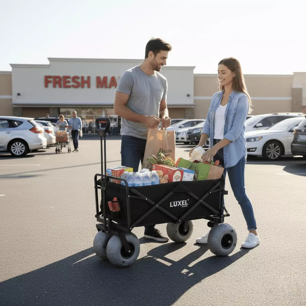 Man and woman with a Luxor wagon filled with groceries in front of a Fresh Market store.