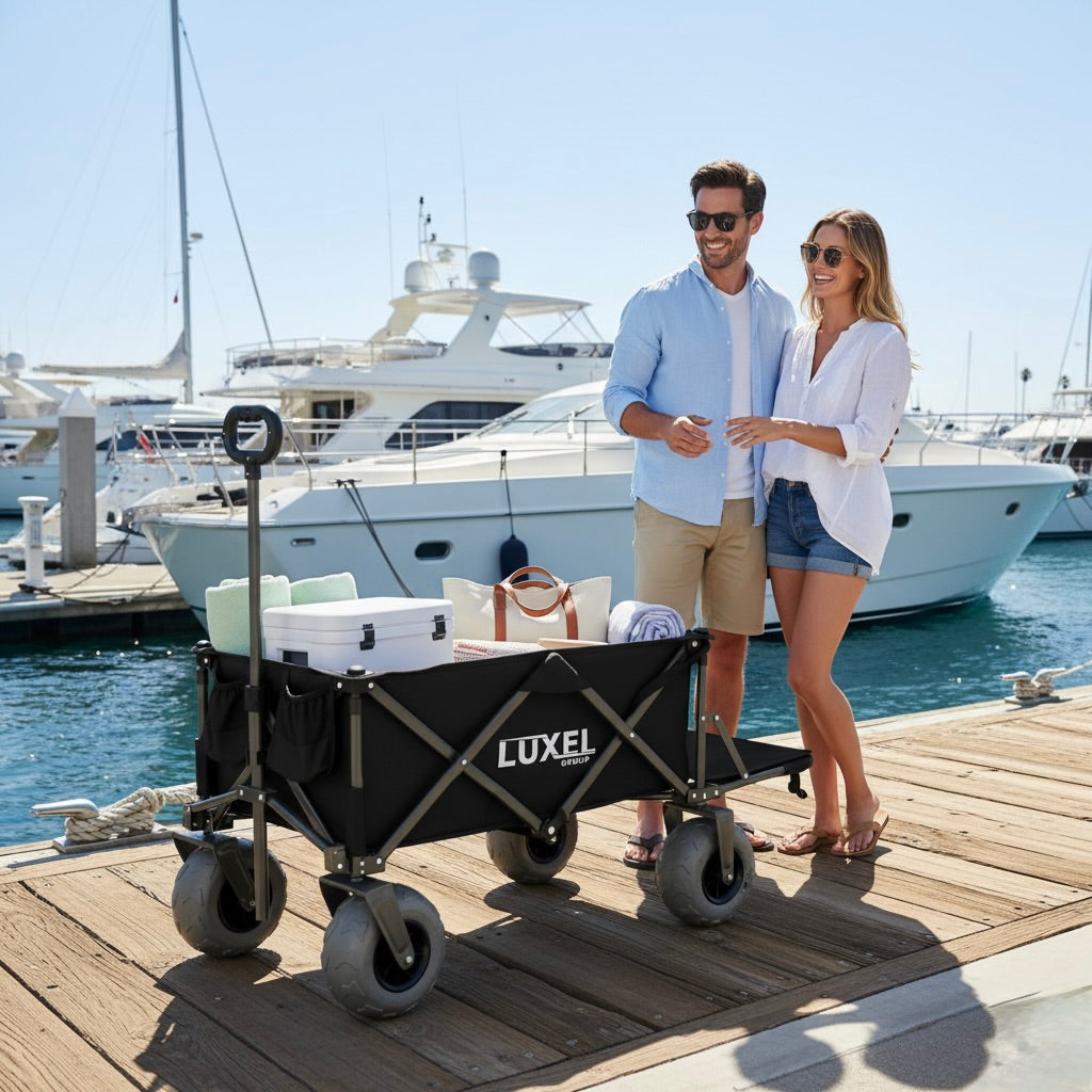 Man and woman standing next to a Luxel wagon on a dock with yachts in the background.