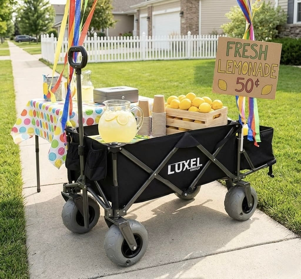 Black Luxel wagon with lemonade stand setup on a sidewalk